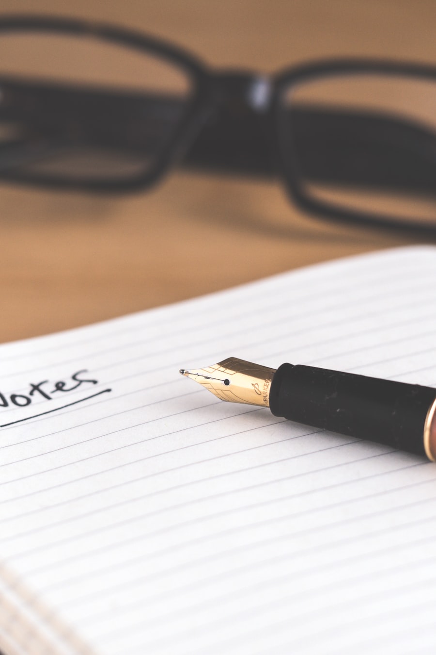 An open notebook with a fountain pen, ready for notes
